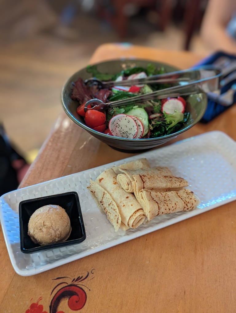 Salad and a Norwegian flatbread start the three course meal at Akershus Royal Banquet Hall