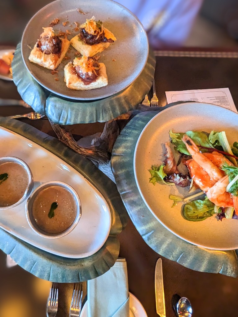 A trio of appetizers on a tree shaped plate stand at Artist Point