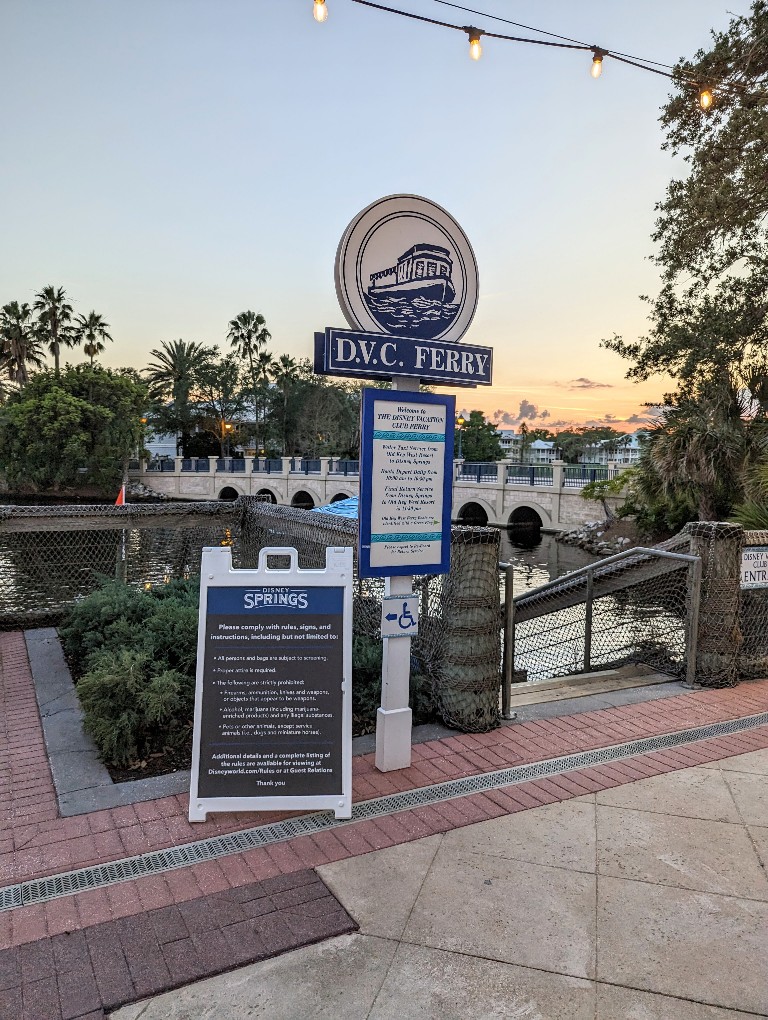 DVC Ferry sign during sunset with steps down to the boat dock at Old Key West