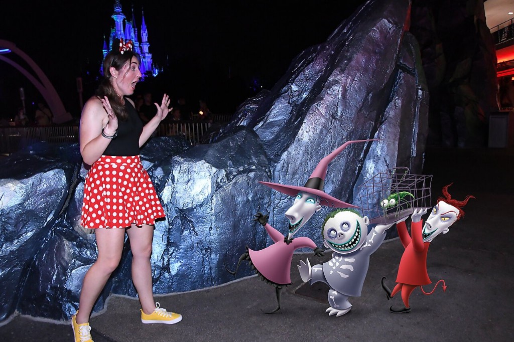 A startled woman is surprised by Lock, Shock, and Barrel in a MNSSHP magic shot