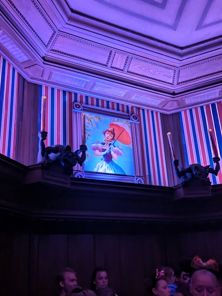 A portrait in the Haunted Mansion stretching chamber is slowly revealed
