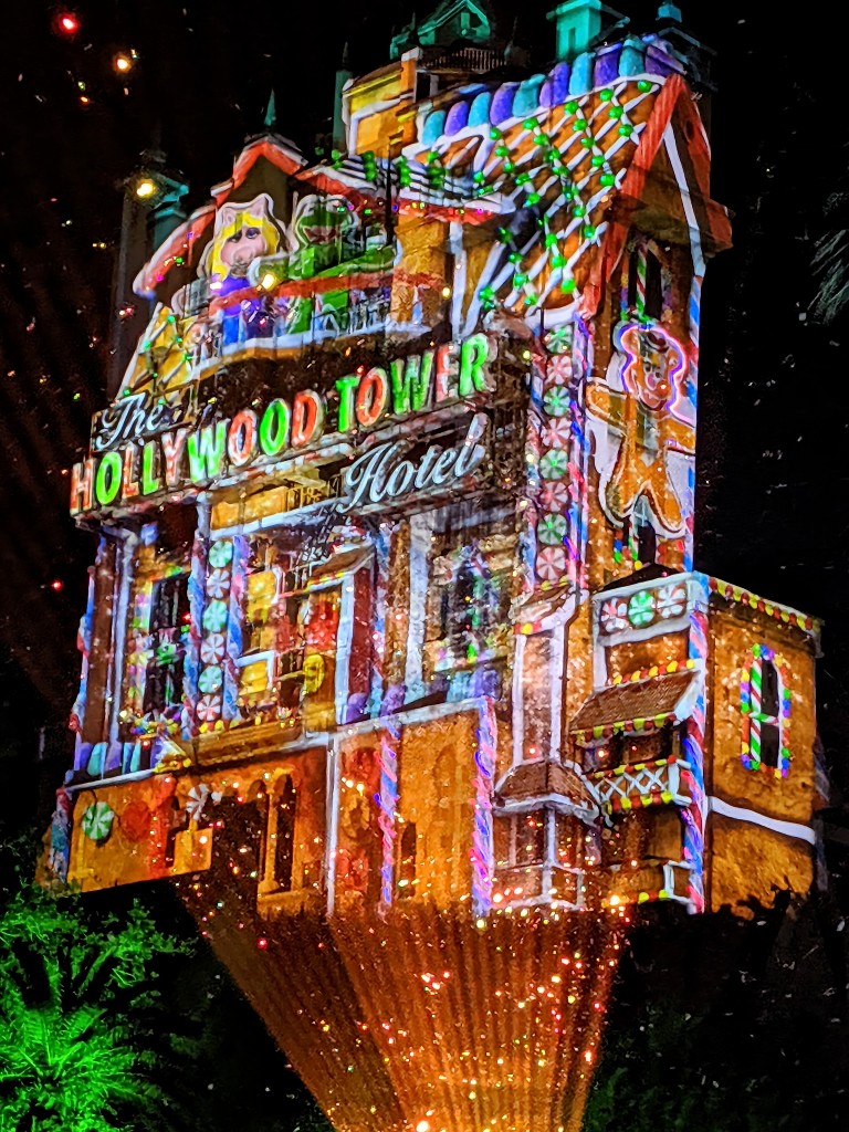 Tower of Terror magically transformed into a colorful gingerbread house at Hollywood Studios