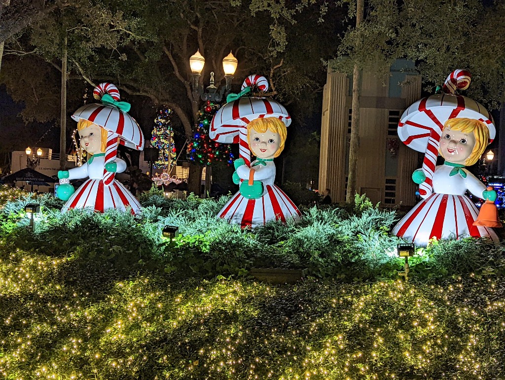 Retro styled oversized ceramic girls in peppermint dresses and umbrellas are charming holiday decor at Hollywood Studios