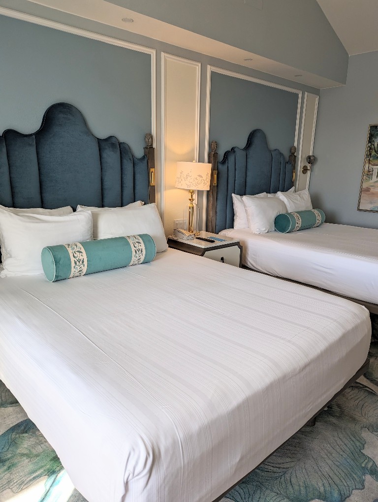 Blue velvet fabric headboards look luxurious in the new Grand Floridian Resort Mary Poppins rooms