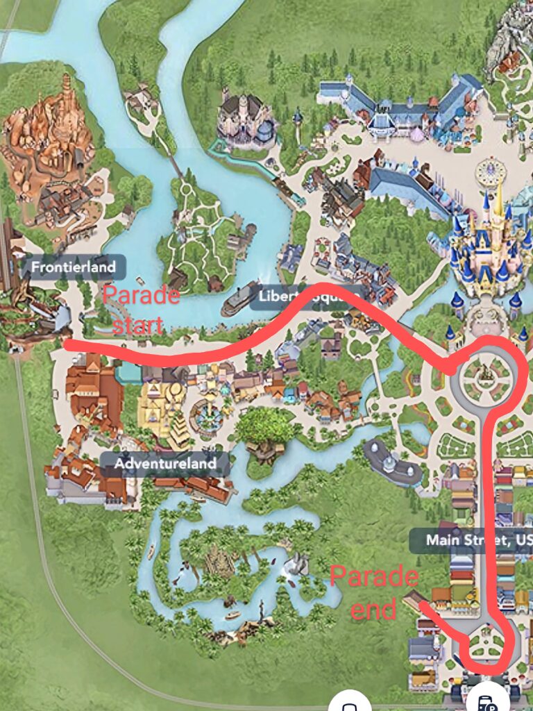 The parade route for Mickey's Once Upon a Christmastime Parade is highlighted in red starting in Frontierland and continuing to Main Street