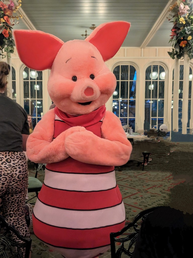 Piglet saunters over to a table at The Crystal Palace